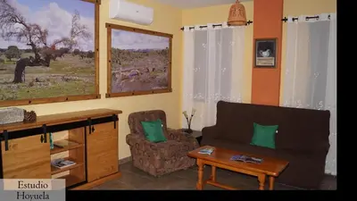 Zona de estar de Apartamentos Estrellas de Monfragüe