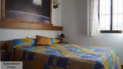 Cama o camas de una habitación en Apartamentos Estrellas de Monfragüe