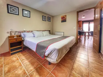 Cama o camas de una habitación en Hostal la Colmena