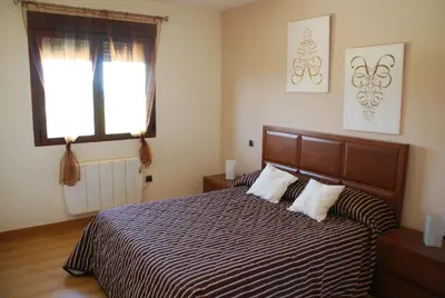 Cama o camas de una habitación en Casa Rural Mirando a Gredos