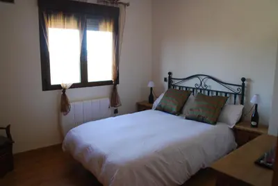 Cama o camas de una habitación en Casa Rural Mirando a Gredos