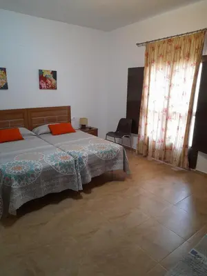 Cama o camas de una habitación en Casa Rural La Jara