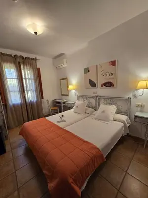 Cama o camas de una habitación en Hotel Rural La Casa De Pasarón