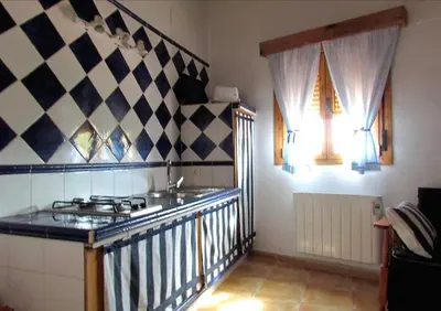 Una cocina o zona de cocina en Apartamentos Rurales Azabal, LAS HURDES, ATR-CC-00260