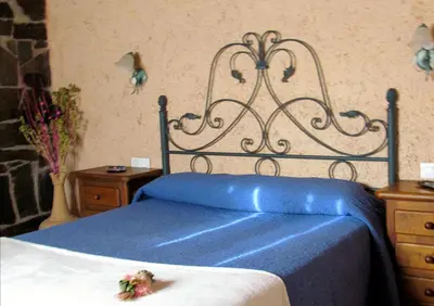Cama o camas de una habitación en Apartamentos Rurales Azabal, LAS HURDES, ATR-CC-00260