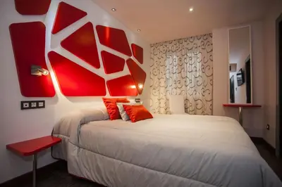 Cama o camas de una habitación en Hostal Barcelona