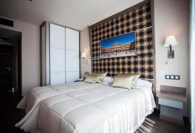 Cama o camas de una habitación en Hostal Barcelona