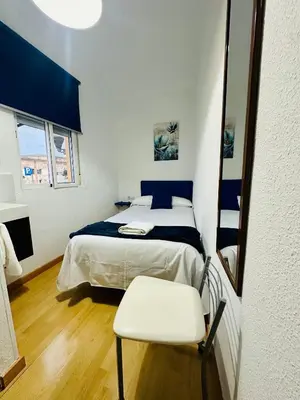 Cama o camas de una habitación en Apartamentos Jamé Mérida