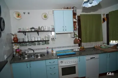Una cocina o zona de cocina en Casa Rural Abuela Maxi