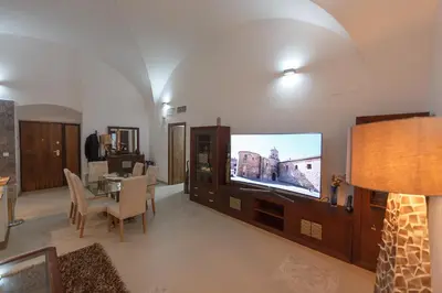 Una televisión o centro de entretenimiento en Casa Palacio Muñoz Chaves