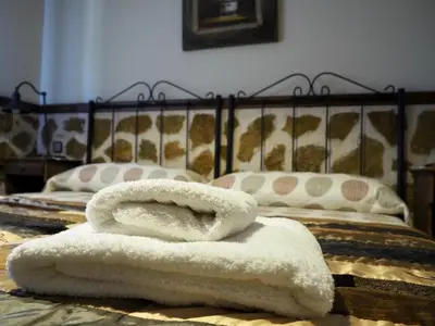 Cama o camas de una habitación en El Rincón de Anter