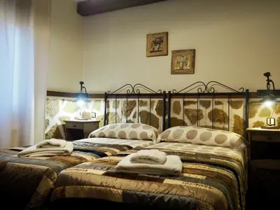 Cama o camas de una habitación en El Rincón de Anter