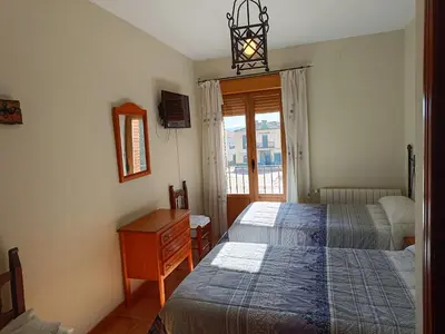 Cama o camas de una habitación en Casa Rural El Botánico