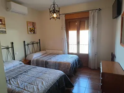 Cama o camas de una habitación en Casa Rural El Botánico