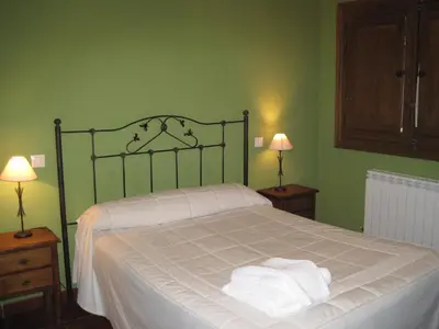 Cama o camas de una habitación en Hospederia La Serrota