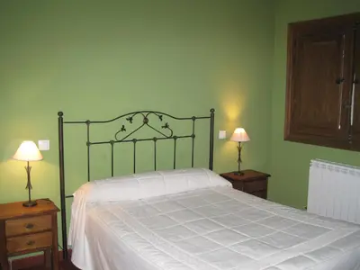 Cama o camas de una habitación en Hospederia La Serrota