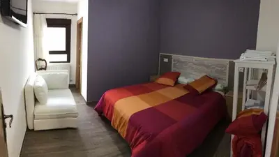 Cama o camas de una habitación en Casa Rural El Batán Casa rural 37 personas