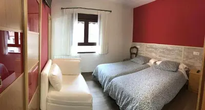 Cama o camas de una habitación en Casa Rural El Batán Casa rural 37 personas