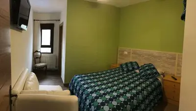 Cama o camas de una habitación en Casa Rural El Batán Casa rural 37 personas