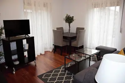 Una televisión o centro de entretenimiento en Apartamento Marquesa de Almarza