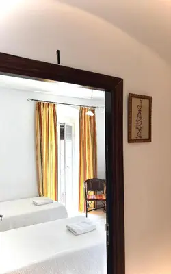 Cama o camas de una habitación en Casa Rural la Plaza