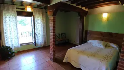 Cama o camas de una habitación en Casa Rural Espeñitas