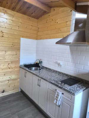 Una cocina o zona de cocina en Cabañas Miraduero