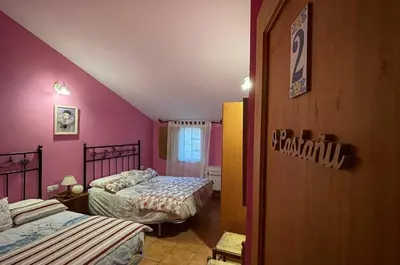 Cama o camas de una habitación en Casa Rural Las 6 Hermanas