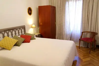Cama o camas de una habitación en Benavites 5 céntrico junto ayuntamiento