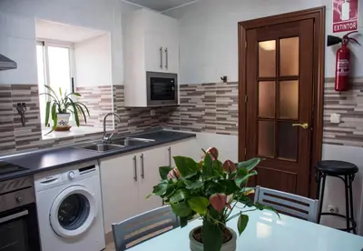 Una cocina o zona de cocina en Apartamento Palacio Antigua Audiencia