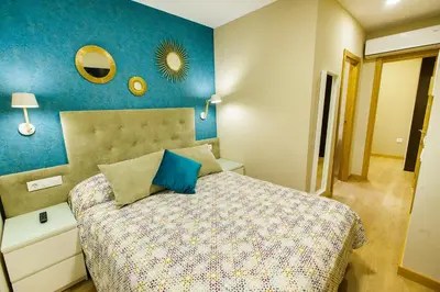 Cama o camas de una habitación en Hospedería Castilla Plaza Mayor