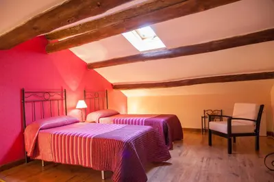 Cama o camas de una habitación en Casa Rural La Cenicienta