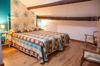 Cama o camas de una habitación en Casa Rural La Cenicienta