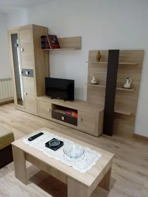 Una televisión o centro de entretenimiento en Alojamiento Samumari