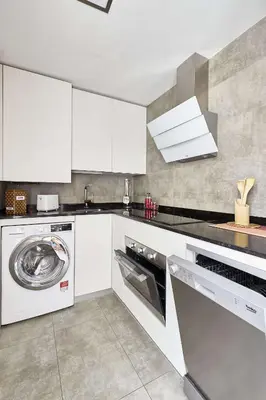 Una cocina o zona de cocina en +Homes | El Patio de la Catedral
