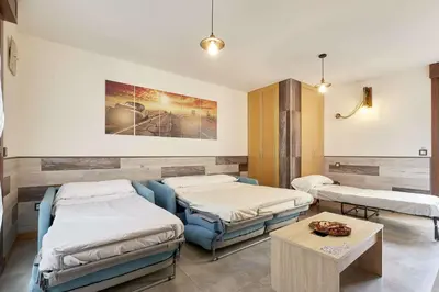 Cama o camas de una habitación en +Homes | El Patio de la Catedral