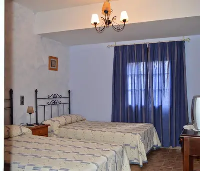 Cama o camas de una habitación en Posada La Reja