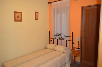 Cama o camas de una habitación en Posada La Reja