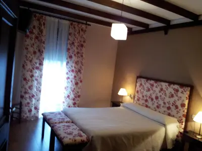 Cama o camas de una habitación en Apartamentos El Mirador Del Soto