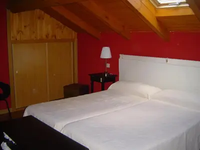 Cama o camas de una habitación en Hotel Balneario Almeida Dama Verde