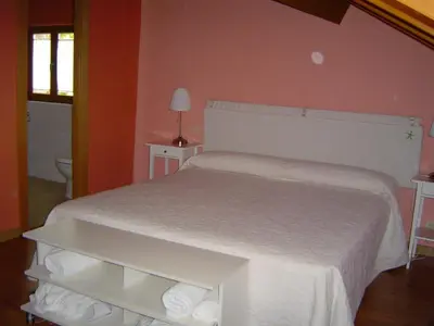 Cama o camas de una habitación en Hotel Balneario Almeida Dama Verde