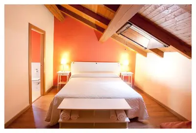 Cama o camas de una habitación en Hotel Balneario Almeida Dama Verde