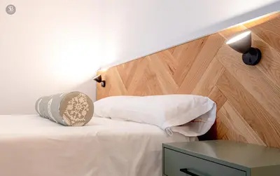 Cama o camas de una habitación en Apartamentos Soho Boutique Plaza Mayor Caceres