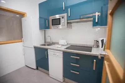 Una cocina o zona de cocina en Apartamentos Soho Boutique Plaza Mayor Caceres