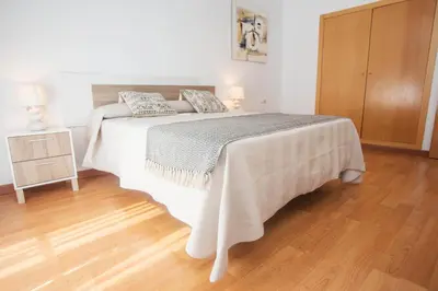 Cama o camas de una habitación en Apartamentos Soho Boutique Plaza Mayor Caceres