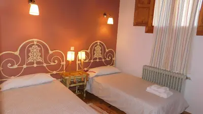 Cama o camas de una habitación en Casa Rural La Silla de la Reina