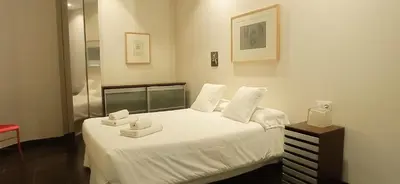 Cama o camas de una habitación en Apartamentos Arquitas