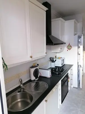 Una cocina o zona de cocina en Atico