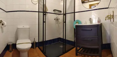 Un baño de Alojamientos La Herrera