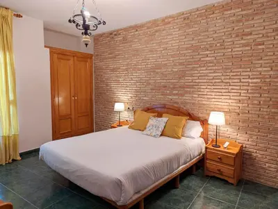 Cama o camas de una habitación en Hotel Moregón